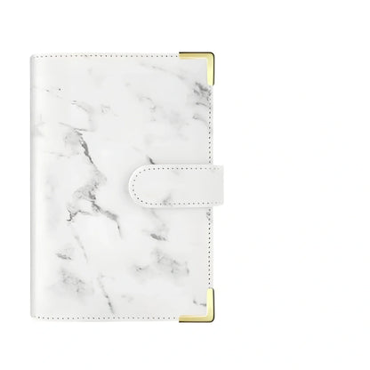 A6 leather PU binder journal open showing colour budget sheets and zip pockets with spiral binding