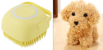 Blue silicone dog bath and massage brush held in a hand.