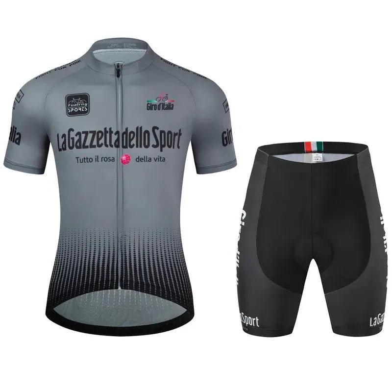 Loop short sleeve cycling suit in a patterned colour on a road bike, showing moisture-wicking fabric.