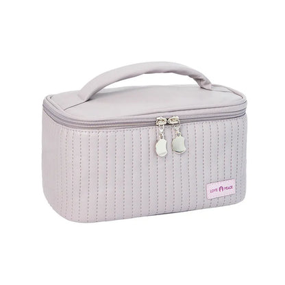 Open-top cake makeup bag in six colour options with PU leather construction and 20cm dimensions