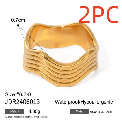 Stainless steel geometric wave ring with 8mm wide band and electroplated finish