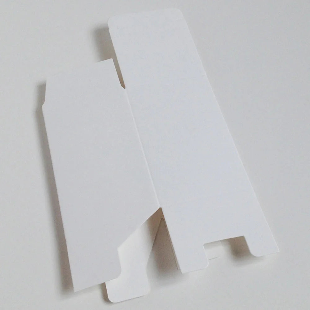 White paper storage boxes showing size variations from 3x3cm to 10x10cm base with different height options