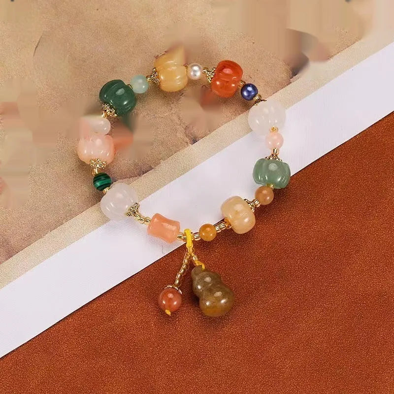 White Bodhi root bracelet with carved pumpkin lotus beads including Apple Orchard and Duobao styles