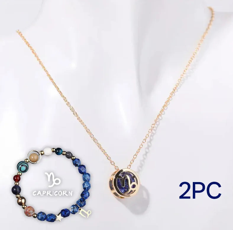 A natural stone beaded necklace and matching adjustable bracelet laid flat.