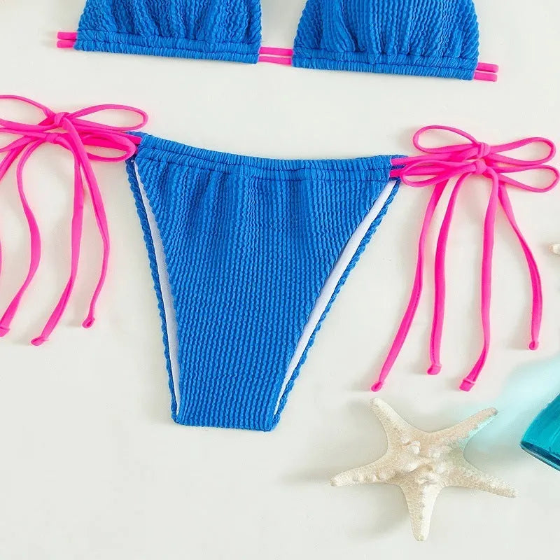 Women's black lace-up nylon bikini set for swimming.