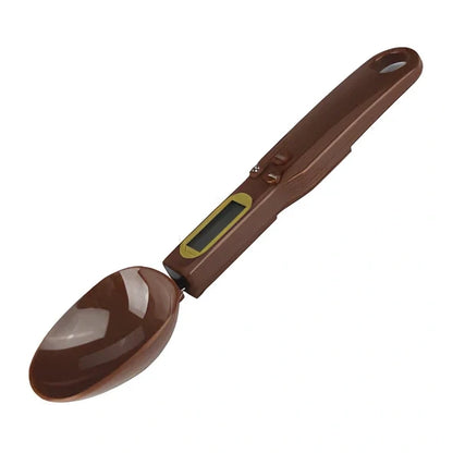 Digital kitchen spoon scale showing measurement display and USB charging port