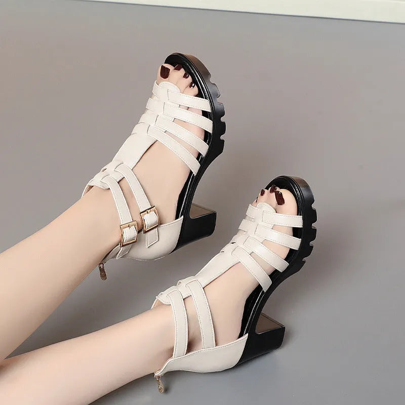 Women's beige hollow-out high heels with rhinestone detail and a buckle fastening
