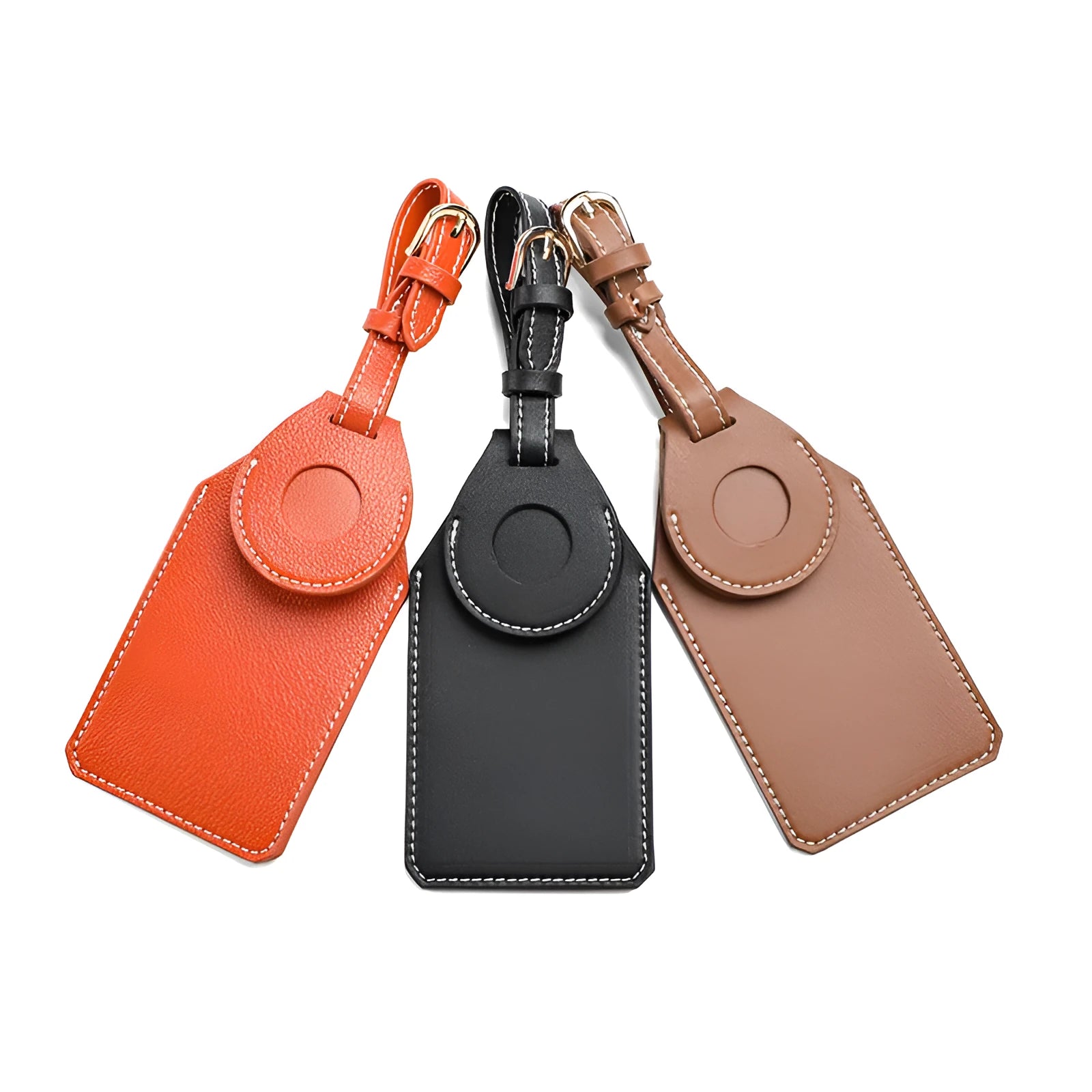 Luggage tag tracker protective cover in black, brown, and orange colours made from PU/PVC material.