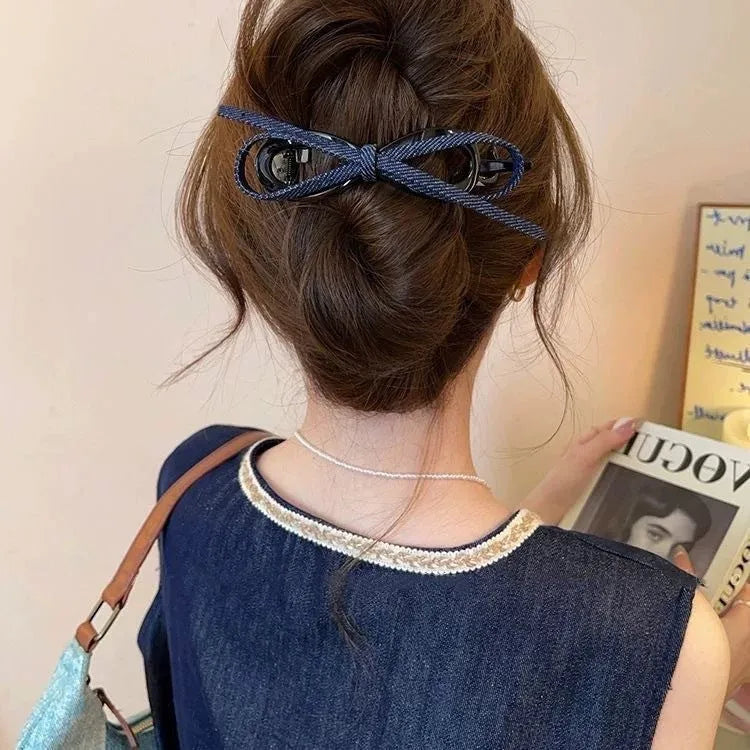 Handmade fabric bow hair grip with triangle grip design and plastic hairpin