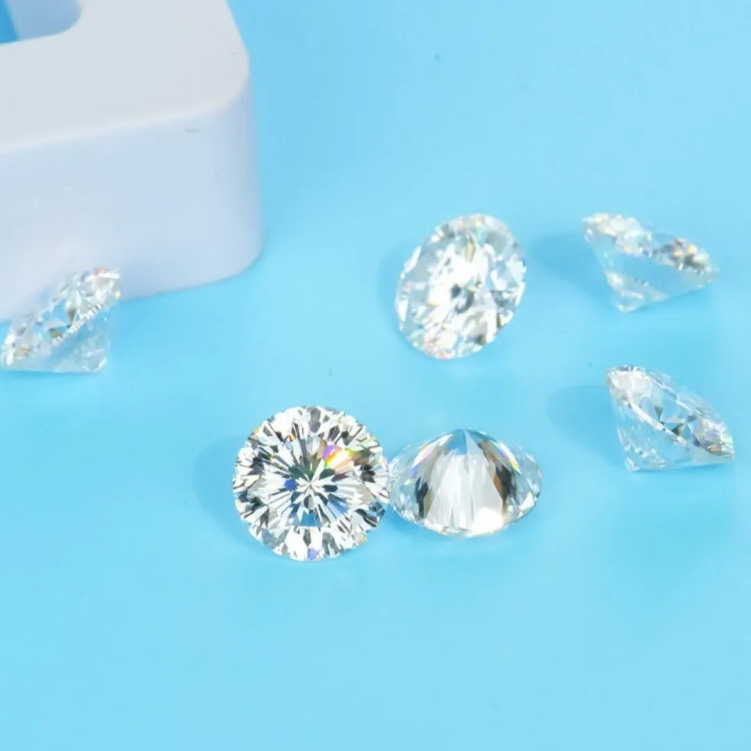 Round moissanite gemstone showing eight hearts and eight arrows cut pattern.