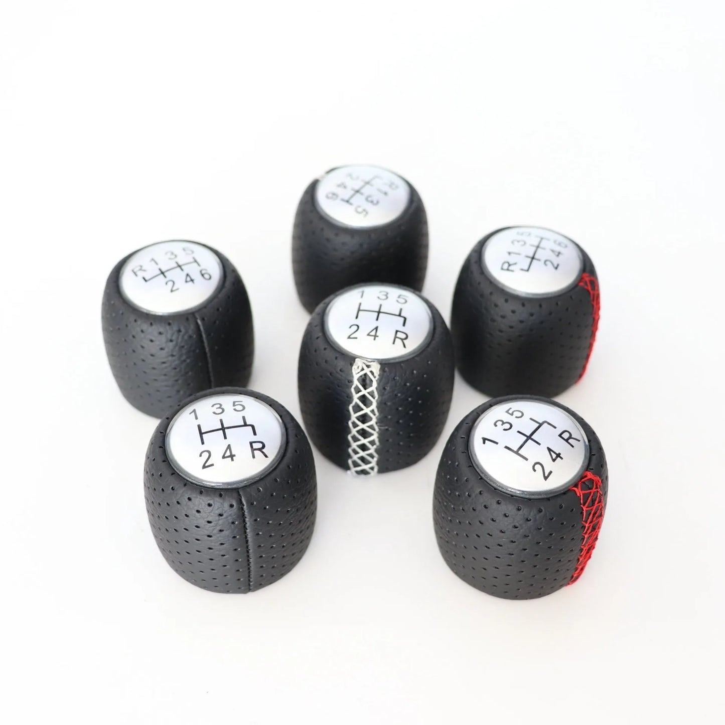 Alpha vehicle shift handball with wrapped perforated leather in black, red, or white line colours