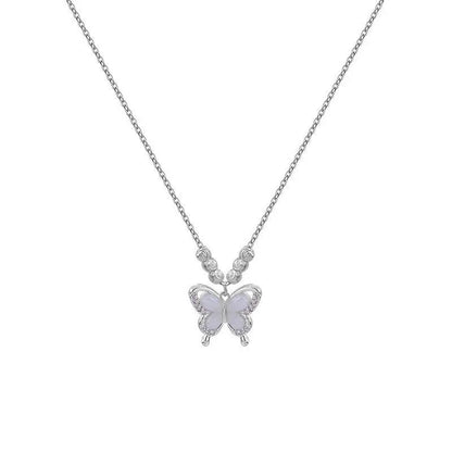Close-up of a women's silver necklace with a geometric butterfly pendant on a textured chain, adjustable from 41cm to 50cm.