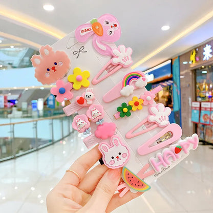 14-piece toddler hair accessories set showing colourful candy rainbow barrettes, fruit clips, and butterfly hair pins