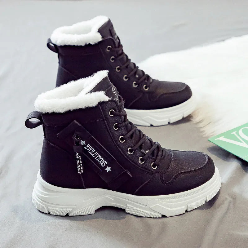 Plus size women's fleece-lined snow boot with tall crown, mid-heel, and front lace-up fastening.