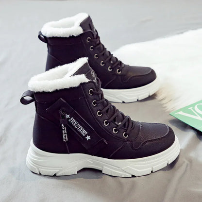 Plus size women's fleece-lined snow boot with tall crown, mid-heel, and front lace-up fastening.