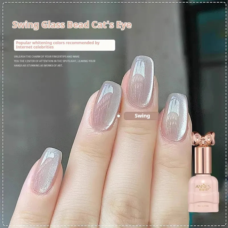 Bottle of micro glass bead cat's eye gel nail polish for magnetic nail art.