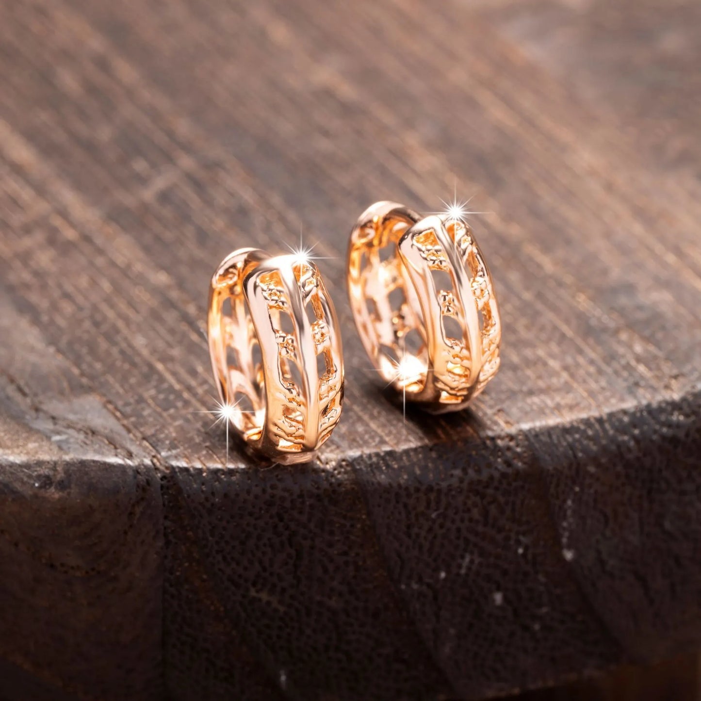 Copper heart and leaf shaped earrings with hollowed-out design and rose gold finish