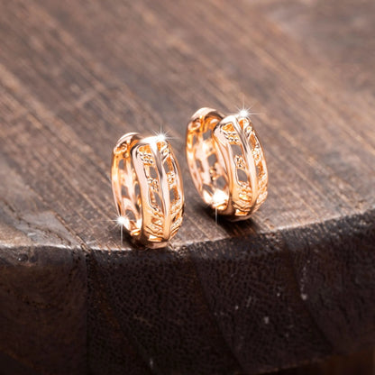 Copper heart and leaf shaped earrings with hollowed-out design and rose gold finish