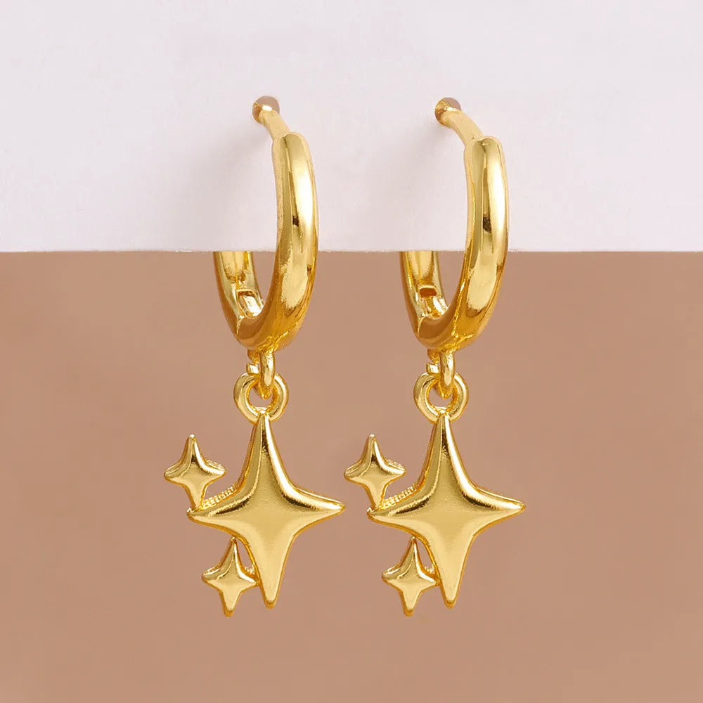 Small star-shaped copper earrings for women in gold or silver, supplied as one pair