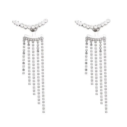 Sparkling zircon tassel earrings in sterling silver, featuring dazzling gems and flowing tassels for a bold, fashionable look.