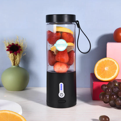 Black portable juicer with 530ml cup, USB charging port, and round feeding port for whole fruits