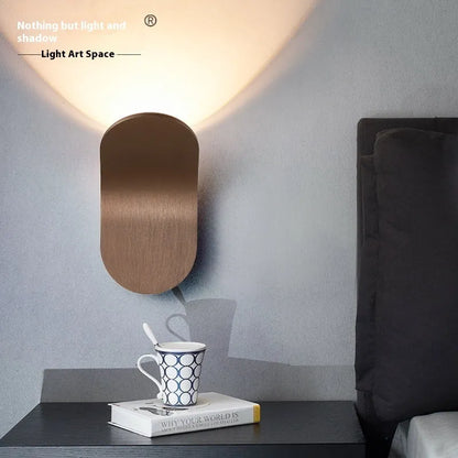Brushed metal wall light bulb for living rooms in modern simplicity design with compact dimensions