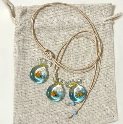 Women's necklace with coloured glaze pendant on a cotton-linen chain, showcasing world-style design