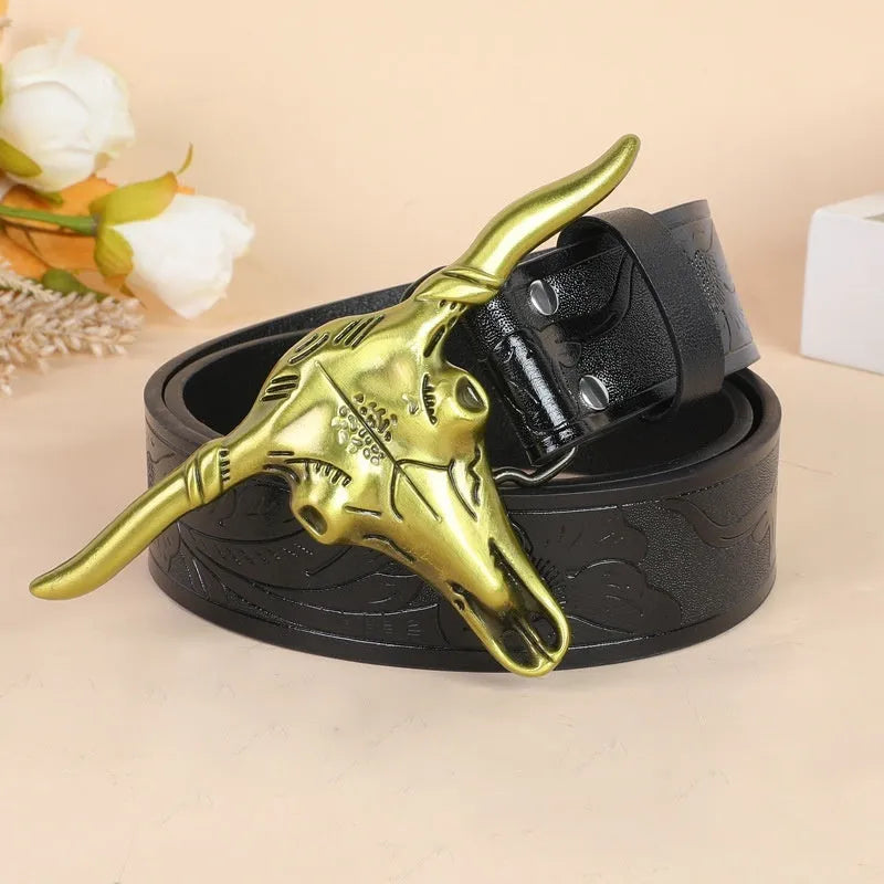 Men's brown imitation leather belt with an embossed alloy cow head pin buckle fastened on trousers.