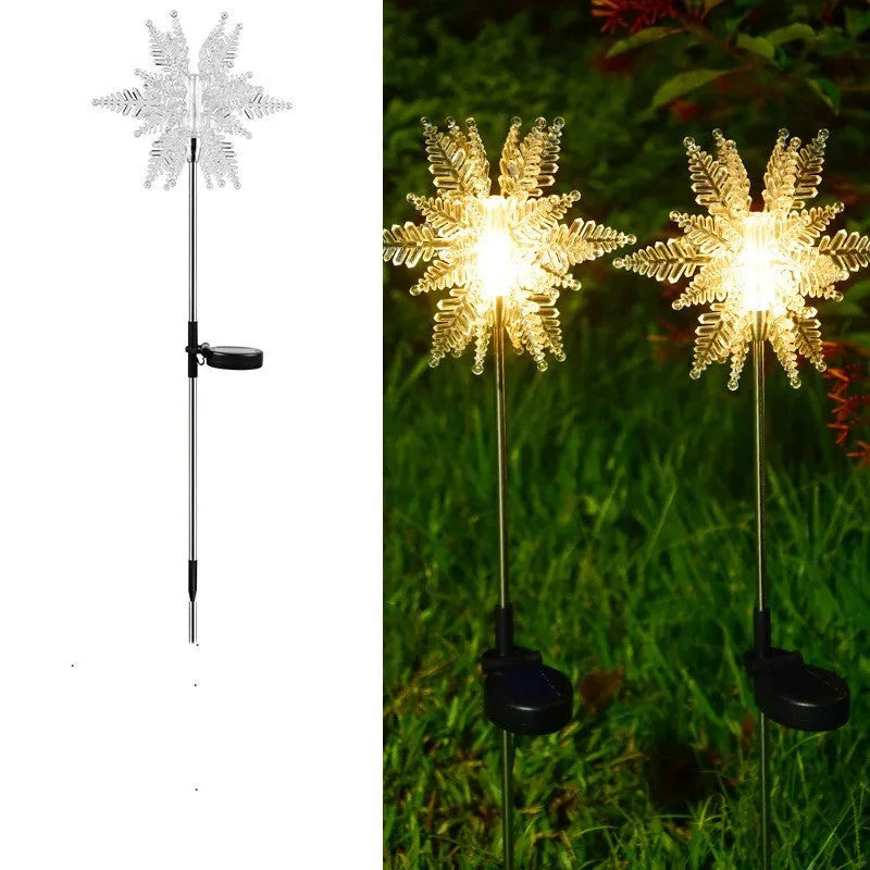 LED solar snowflake garden light with flower-shaped head, warm light, and 2V 100mA solar panel for outdoor lawn use