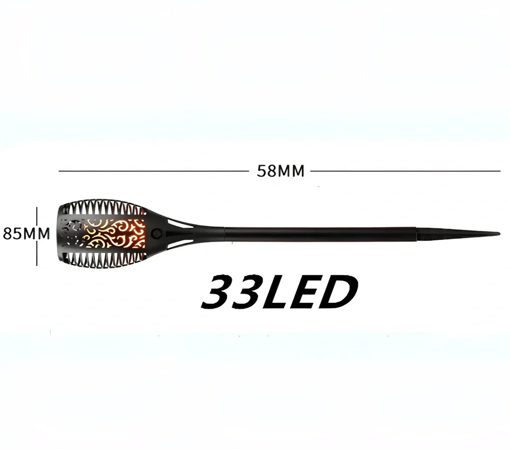 Solar garden LED light with flame flickering effect on stainless steel stake in outdoor setting