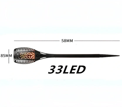 Solar garden LED light with flame flickering effect on stainless steel stake in outdoor setting