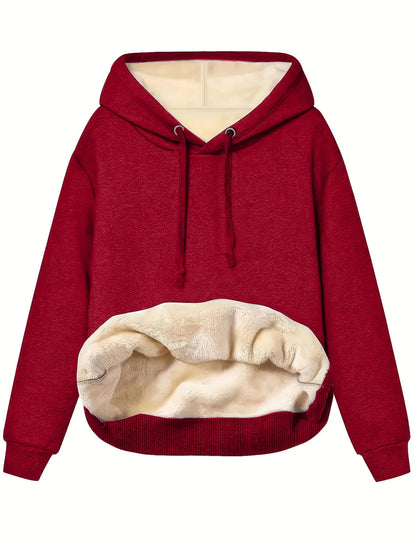 Women's loose fit hooded sweater in thick grey polyester fleece with 3D pattern and front pockets.