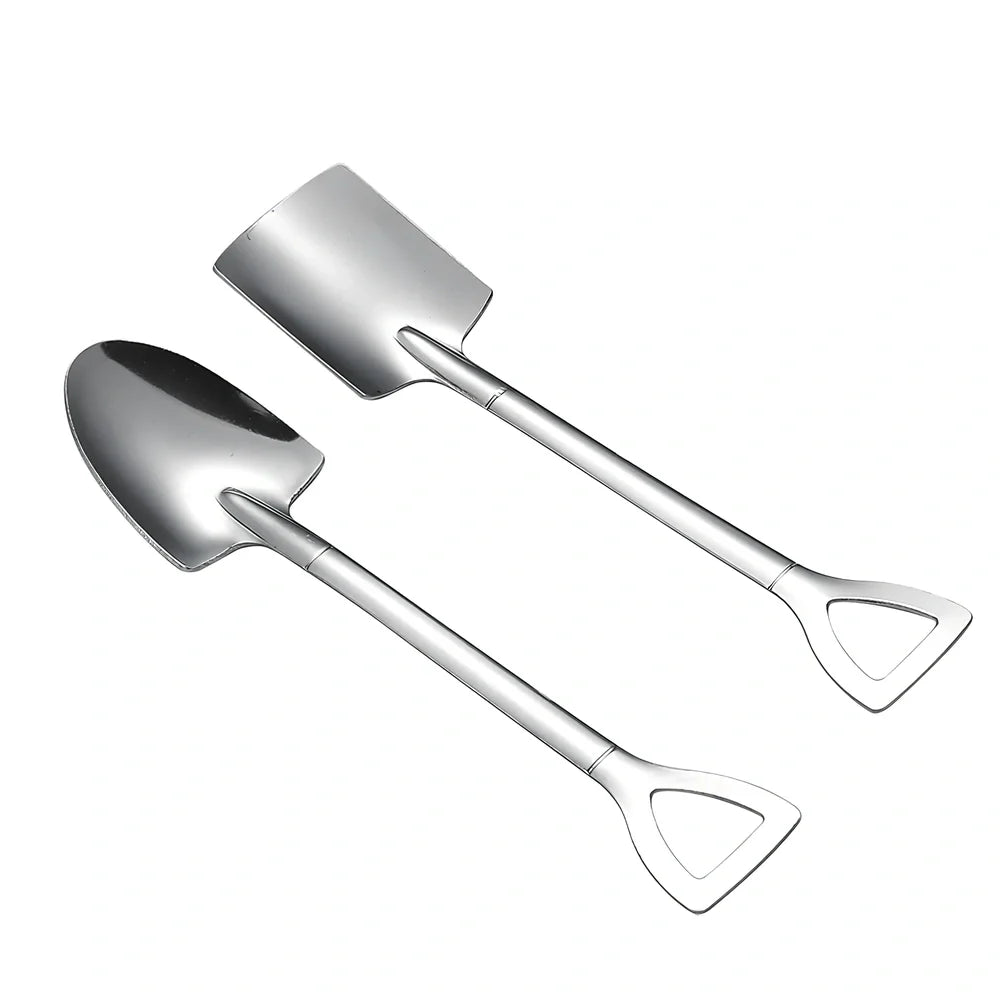 Orange ceramic Halloween pumpkin mug with cartoon face and included spoon on autumn table