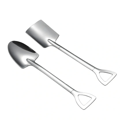 Orange ceramic Halloween pumpkin mug with cartoon face and included spoon on autumn table