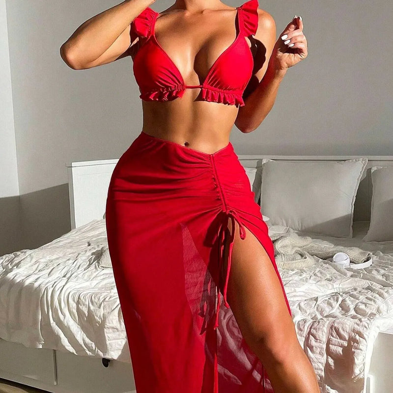 Women's printed split swimsuit with skirt style three-piece bikini set in polyester fabric, available in six colours including brown, red, white, sapphire blue, orange, and multicolour, sizes S to XXXL with fit guidance for Asian sizing.