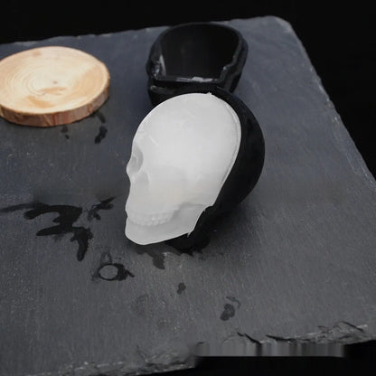 3D Halloween skull ice cube tray made of blue food-grade silicone.