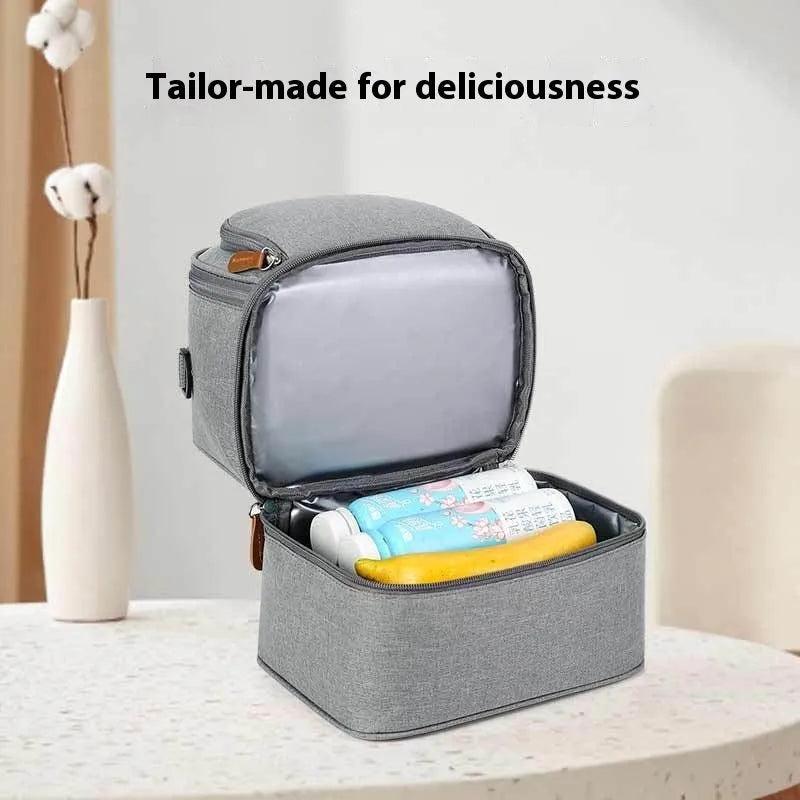 Grey Oxford cloth women's thermal insulation backpack with curved shoulder straps.