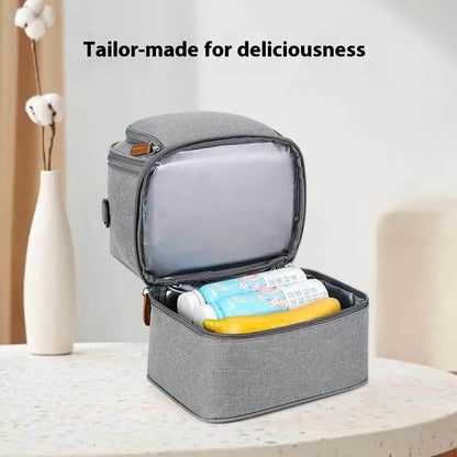 Grey Oxford cloth women's thermal insulation backpack with curved shoulder straps.