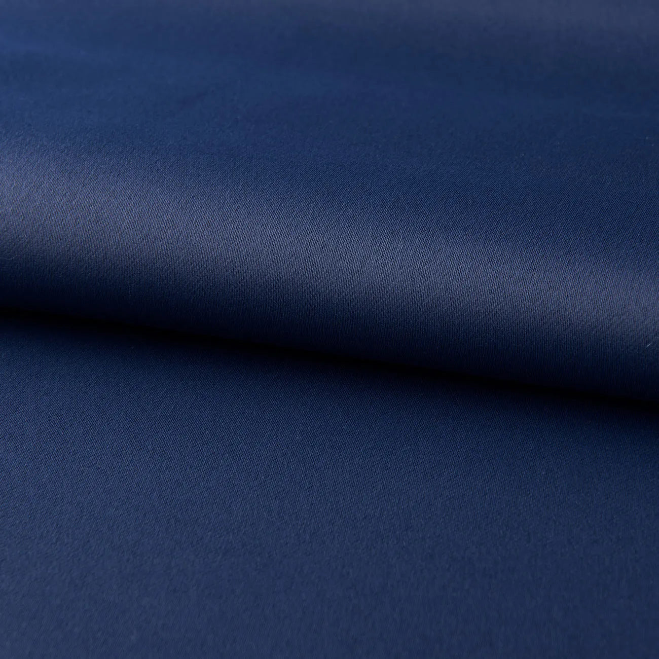 Dark navy blue blackout bedroom curtains hanging with modern simple style