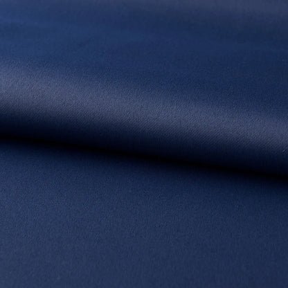 Dark navy blue blackout bedroom curtains hanging with modern simple style