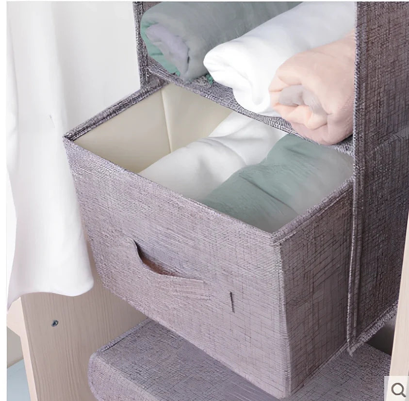 Cotton hanging storage bag with multiple drawers measuring 24.6cm each