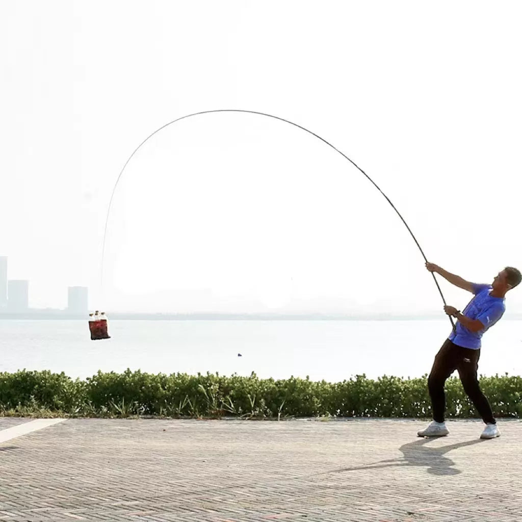 Super Light Nest Carbon Fishing Rod for large objects, available in silver and gold