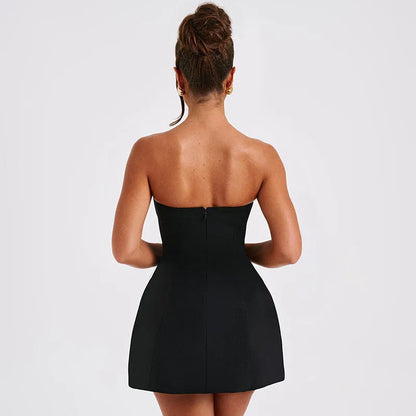 Backless women's tube dress in solid colour with high waist and A-line short skirt.
