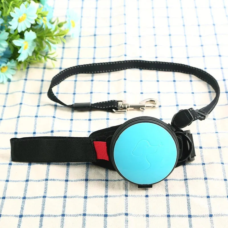 Automatic retractable dog leash extended to 3 metres with a lock button, shown in vibrant orange.