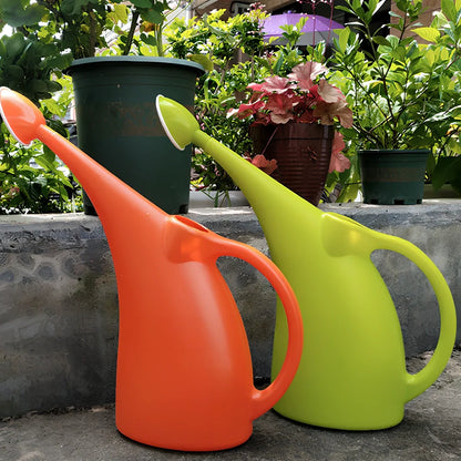 Green watering can with long spout showing measurements and shower head attachment for garden plants