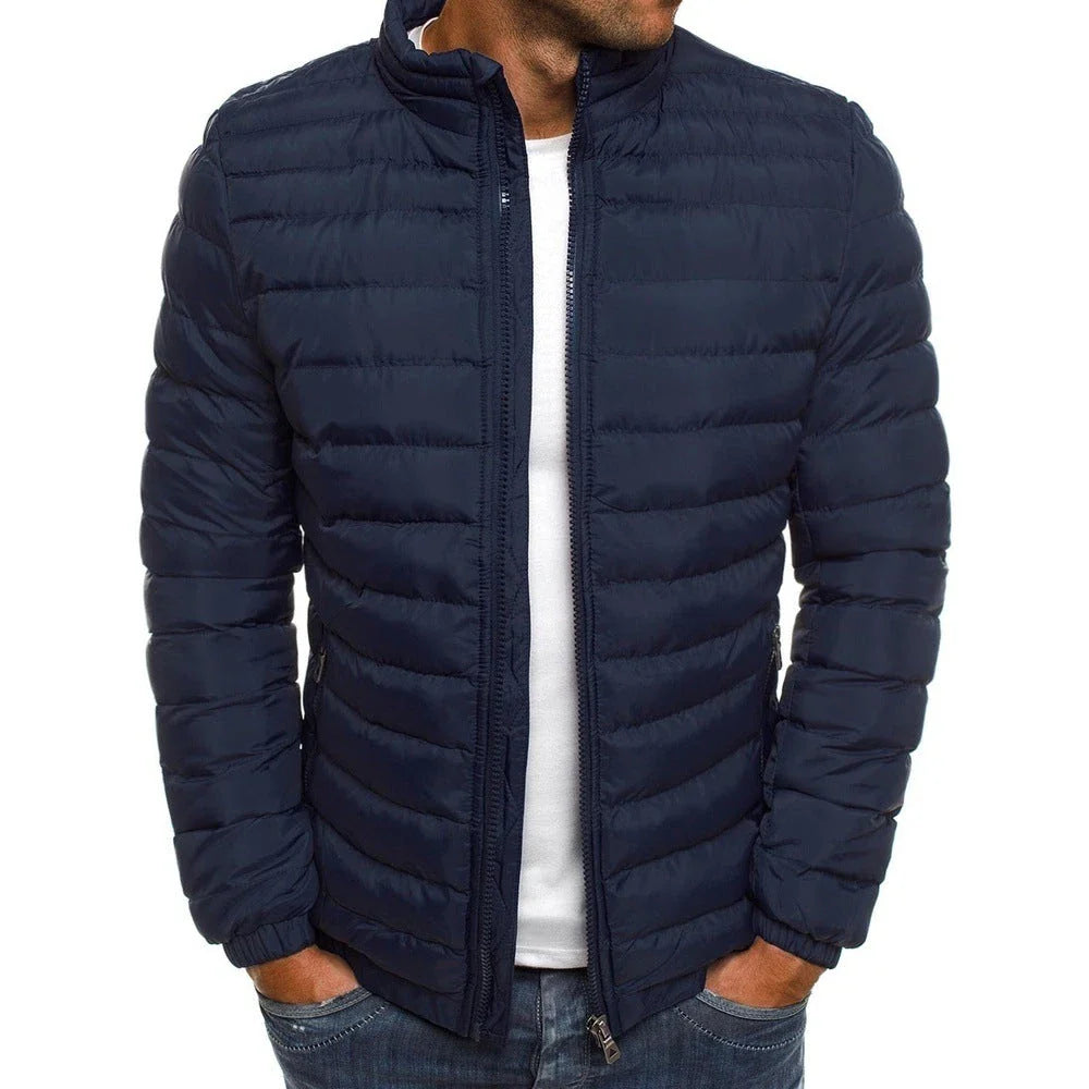 Warm padded winter jacket for men in various solid colors, featuring zippered pockets and a loose, comfortable fit for easy layering.