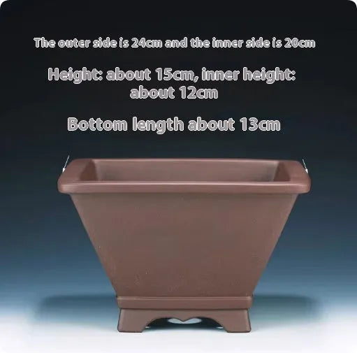 Square purple clay succulent bonsai pot with classical design on wooden table