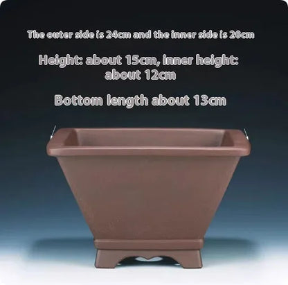 Square purple clay succulent bonsai pot with classical design on wooden table