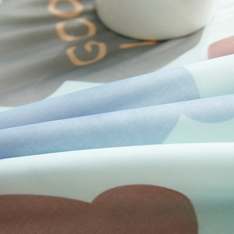 Ultra-soft, machine-washable cooling quilt made with breathable ice silk fabric for year-round comfort