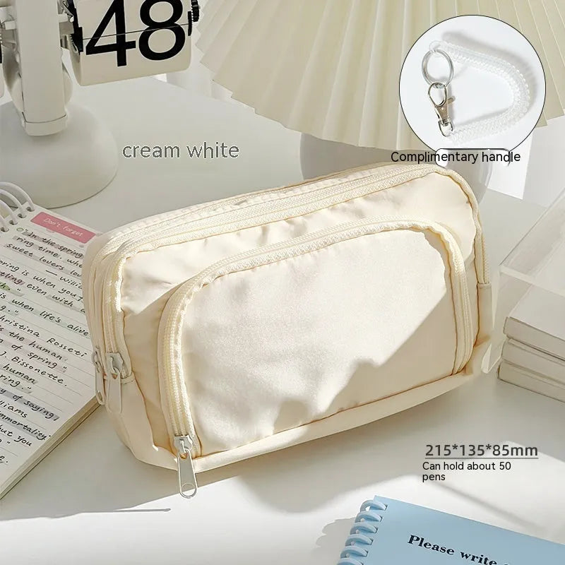 Double layer pencil case in solid colour with gift handle, dimensions 215mm by 135mm